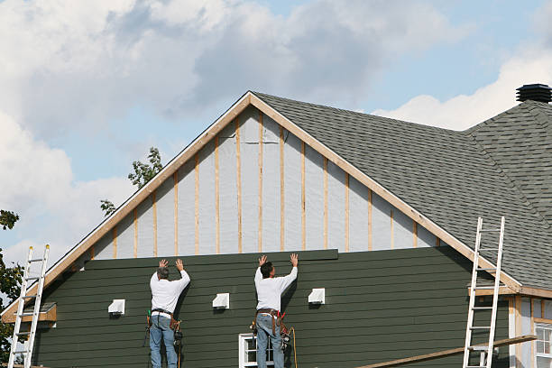 Professional Siding technician working in De Graff, OH